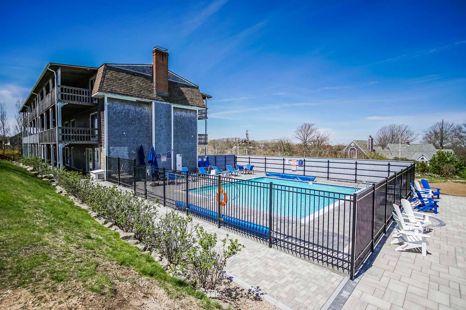 A scenic swimming pool at VRI's Neptune House Resort in Rhode Island.
